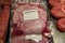 Packages raw veal sweetbreads on display at a market butcher in Stockholm, Sweden