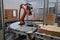 packaging and sorting robot, with its mechanical arms moving swiftly to package customer orders