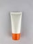 Packaging, Tube type, Small plastic tube, Orange color, Open type