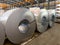 Packed rolls of coil steel in stock waiting for move to process slitter