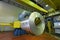 Packed rolls of steel sheet, cold rolled steel coils in factory.