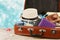 Packed vintage suitcase for summer holidays, vacation, travel and trip.