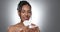 Pad, face and happy woman with feminine hygiene product, menstruation and wellness on grey background. Female health