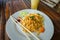 Pad thai noodles with chicken, carrot, shallots and cucumber