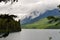 Paddle-boarder on a Mountain Lake