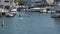 Paddle boarders enjoy the beautiful harbor at Huntington Harbor