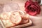 Paddle a butterfly, heart shaped patty crispy with sugar in a wooden plate