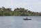 A paddle canoe climbs the PreguiÃ§a River