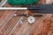 Paddle fishing rod and fishing net on a wooden background top view. Fishing hobby vacation concept. Copy space