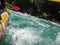 Paddle, river and the side of the boat during rafting