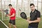 Paddle tennis players posing