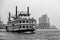 Paddle wheel steamer in the port of Hamburg with the Elbphilharmonie in the background