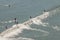 Paddleboarders Catch Wave Off Sao Vicente Brazil Coastline