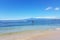 Paddleboarding along Maui shoreline.