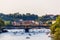 Paddleboats in the Vltava river under Manes Bridge and Charles b