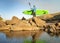 Paddler with inflatable stand up paddleboard