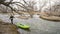 Paddler with whitewater inflatable kayak