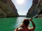 Paddling in Crystal clear turquoise water in Gorges du Verdon, Provence Alps, France.