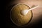 Paddy rice and wooden ladles in Wooden Tray on wooden background