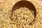 Paddy seed in wooden bowl background