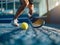Padel Game Focus: Ball and Racket on Court