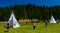 PADINA FEST, ROMANIA - AUGUST 2, 2015: Hikers camp near forest at Padina in Romania on August 2, 2015