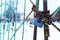 A padlock hanging on a chain of rusty gates in a cemetery, a closed cemetery in the village