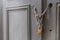 A padlock holding chains in a door/gate