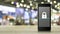Padlock icon on modern smart mobile phone screen on wooden table over blur light and shadow of shopping mall, Technology inte