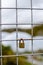 Padlock Locked onto Fence with shallow focus - vertical