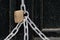 Padlock securing chains on an old wooden door