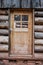 Padlocked Door on Old Log Cabin