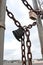 Padlocks And Chains Secure Gate To Industrial Work Site