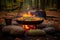 paella pan nestled among burning campfire logs