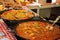 Paella preparation - street market stand near Barcelona Cathedral square