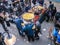 Paella tubs at Covent Garden, surrounded by diners, as seen from above, London, UK.