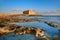 Pafos Harbour Castle in Pathos, Cyprus on a sunset