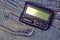 Pager is an old retro gadget for communication on jeans