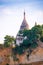 Pagoda on the bank of the Irrawaddy river, Mandalay, Myanmar, Burma. Tour from Mandalay to Bagan. Copy space for text.