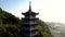 Pagoda upper levels among wild tropical jungle on hill