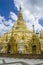 Pagodas encircle the gilded stupa of Shwedagon Pagoda