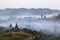 Pagodas in ruins on a dream-like foggy morning in Mrauk U, Rakhine state in Myanmar