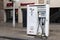 Paid charging station for electric cars. Concept of ecological electric transport. Street of Barcelona, Catalonia, Spain