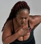 Pain. Close up shot of plump, plus size african american woman in sportswear getting tired, exhausted, feeling pain