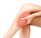 Pain in a leg, woman holding sore shin