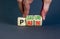 Pain or pleasure symbol. Concept words Pain or Pleasure on wooden cubes. Businessman hand. Beautiful grey table grey background.