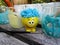 Paint jars and smiley mop head toy