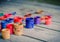 paint jars on a wooden surface