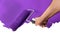 Paint Roller with Purple Over White Wall