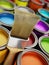 Paintbrush and multicolored paint cans